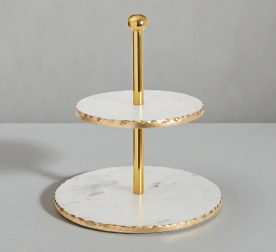 Luxury white marble 2-tier serving stand with gold rough edges.